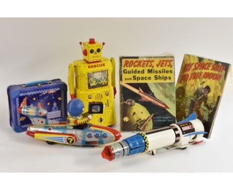 Spaceman in a rocket, filming space scenes, tinplate; Outer Space cookie lunch tin; By Space Ship to the Moon, hardback book;