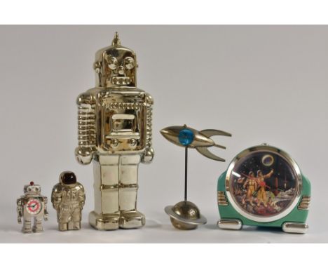 A mid 20th century novelty ceramic money box, as a Silver Robot, Silver robot; another; a novelty lighter, as an astronaut, m