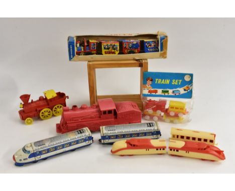 A tinplate train, with engine pulling a coach, made in Japan, with good illustrations of passengers in the windows; a red and