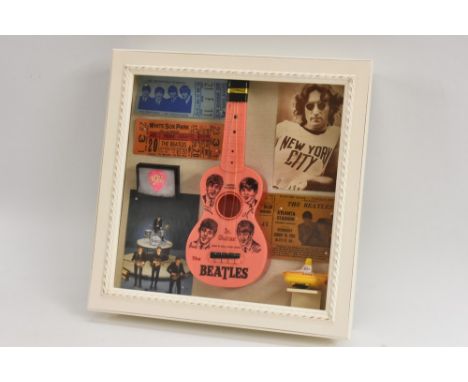 Beatles - a Beatles Junior Guitar, with plectrum, a postcard  of the band; a postcard of John Lennon; three USA show tickets;