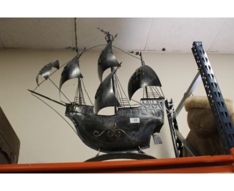 A MODERN METAL MODEL OF A GALLEON 