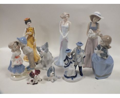 A COLLECTION OF ASSORTED CERAMIC FIGURES TO INCLUDE A LLADRO SEATED CAT FIGURE, NAO FIGURES ETC