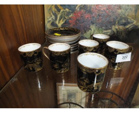 A SET OF SIX CROWN STAFFORDSHIRE COFFEE CANS AND SAUCERS FOR T GOODE &amp; CO - SOUTH AUDLEY, LONDON TOGETHER WITH TWO MORE S