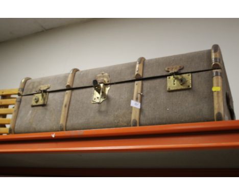 A VINTAGE BANDED PACKING TRUNK 