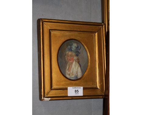 A 19TH CENTURY UNSIGNED GILT FRAMED OVAL PORTRAIT OF A GEORGIAN LADY