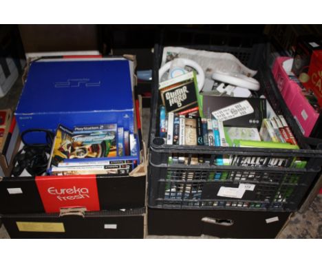 A PS3 CONSOLE TOGETHER WITH A PS2 CONSOLE AND TWO BOXES OF GAMES AND ACCESSORIES