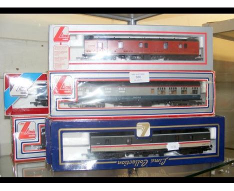 Five boxed Lima carriages 