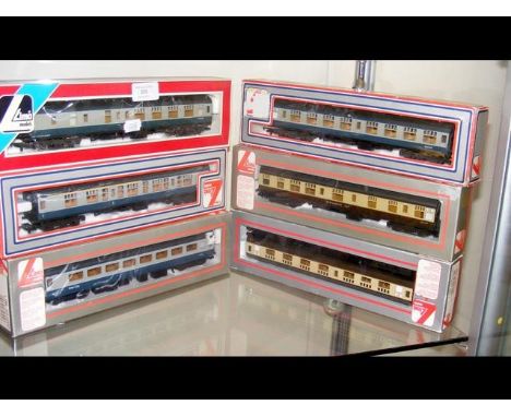 Six boxed Lima carriages 