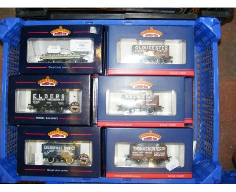 Twelve boxed Bachmann wagons 