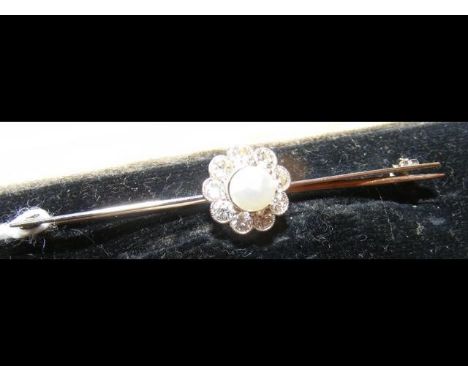 A diamond and pearl bar brooch 