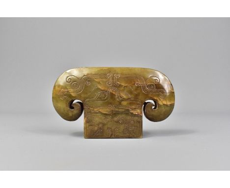 Chinese celadon green scroll weight, carved with buddhist symbolism, approx 13 w x 7.5 h cms. The base is drilled for possibl