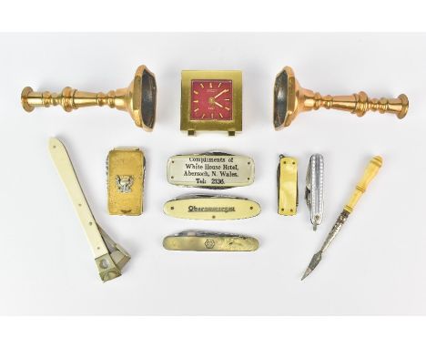 Miscellaneous items, including two brass miniature taper candles, five pocket knives, nut pick, cigar trim and a Looping 8 da