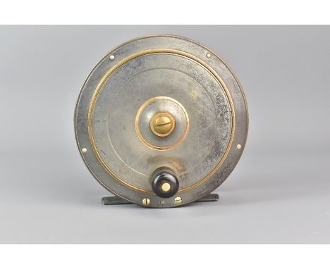 Vintage steel and brass salmon reel, together with a silver and mother of pearl fruit knife.&nbsp;