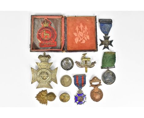 Eleven medallions - including Royal Warwickshire cap badge, Edward VS VII REX Long Service for Volunteer Force medal, Royal W