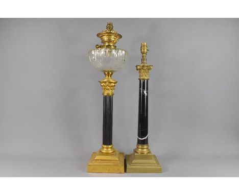 19th century oil lamp with a ormolu corinthian column capital surmounted with a faceted glass reservoir and Young's hardware,