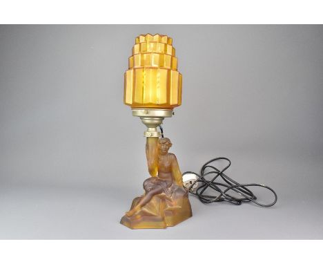Czechoslovakian amber-coloured figural lamp and shade, approx 39 cms h.&nbsp;