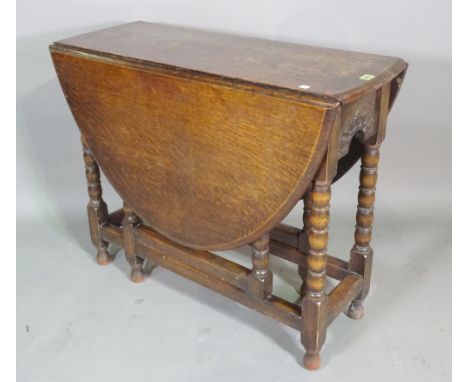 An 18th century style oak gateleg table on bobbin turned supports 90cm wide x 76cm high and a George III mahogany Pembroke ta