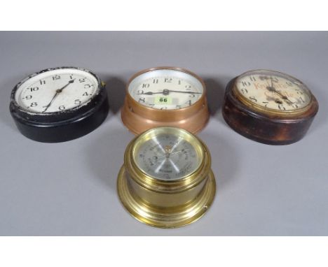 A copper cased capstan style wall clock, two others and a brass cased capstan style aneroid barometer. 