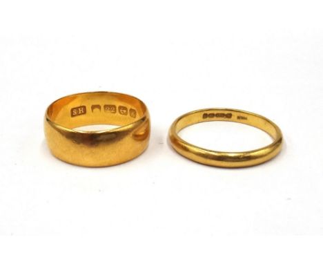 A 22ct gold plain wedding ring, Birmingham 1906, ring size L and a half and a 22ct gold plain wedding ring, Birmingham 1956, 