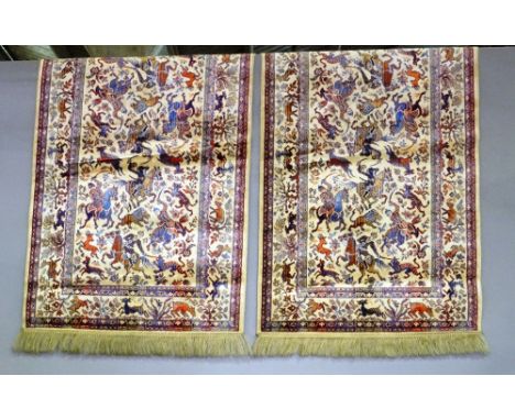 A Turkish silk rug, 156 x 93 and two machine made mats with hunting scenes, 110 x 68 (3). 