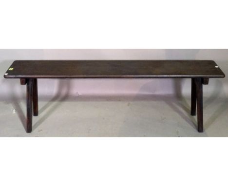 Army & Navy CSL Makers, London Bombay Calcutta'; a late 19th century stained softwood rectangular bench, on folding square su