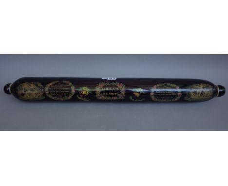 A Victorian purple glass rolling pin of large proportions, printed with 'LOVE AND BE HAPPY' and further moral verse flanked b