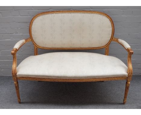 A Louis XVI style salon suite comprising; open arm sofa, 135cm wide x 100cm high, pair of open armchairs, 60cm x 96cm, and tw