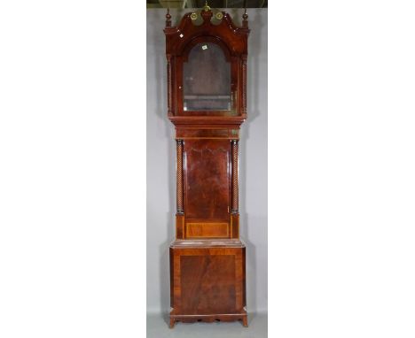 An early Victorian mahogany longcase clock case, lacking movement, the hood and trunk with wrythen turned side columns. 