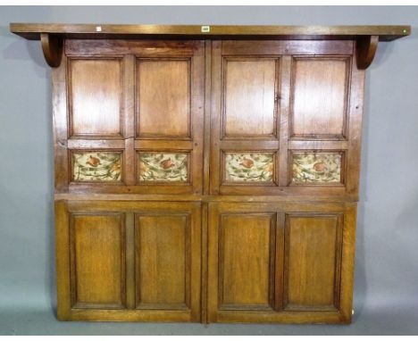 A 19th century oak hanging panel with floral tapestry inserts, 166cm wide x 139cm high. 