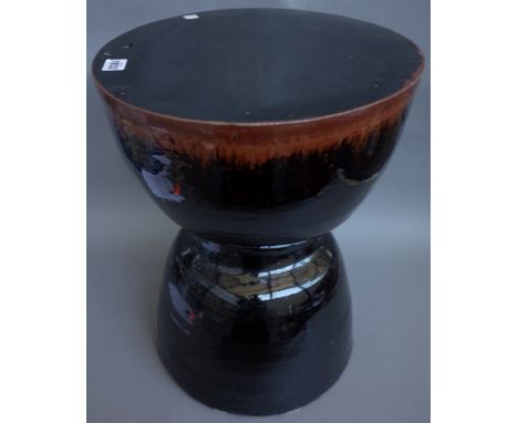 A Bernard Leach style garden seat of inverted goblet form, modern, brown tenmoku glaze, unsigned, 50cm high.