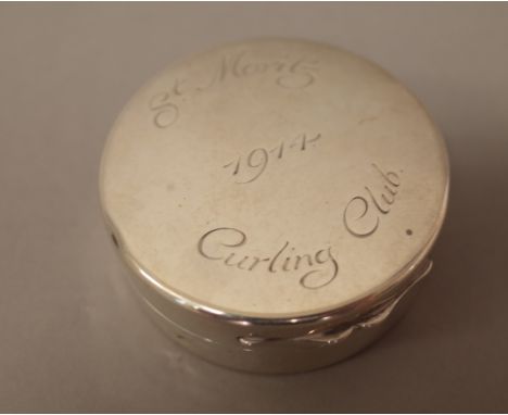 An Asprey, London circular silver cased travelling hinge lidded aneroid barometer cum thermometer, the cover engraved St Mori