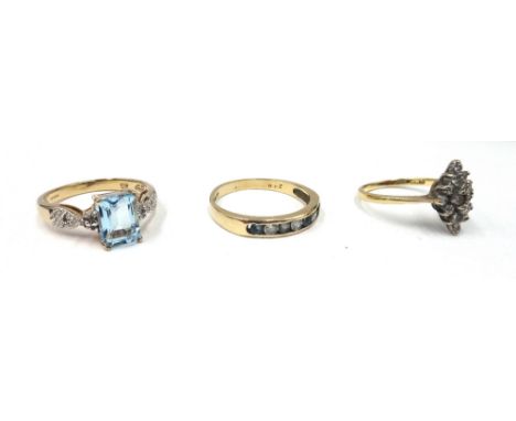 An 18ct gold and diamond set marquise shaped cluster ring, mounted with circular cut diamonds (one diamond lacking), a 9ct go