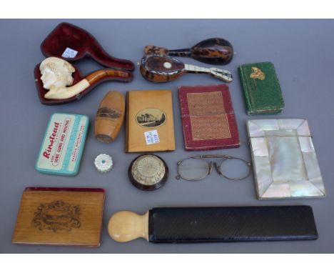 A quantity of small collectables, 19th century and later including; a cased Meerschaum figural pipe, a Mauchline ware string 