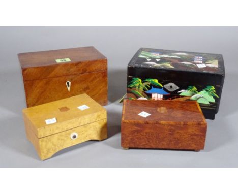 Two small wooden music case boxes, a lacquered jewellery case with music box and a two division tea caddy. 