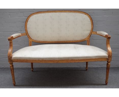 A Louis XVI style salon suite comprising; open arm sofa, 135cm wide x 100cm high, pair of open armchairs, 60cm x 96cm and fou
