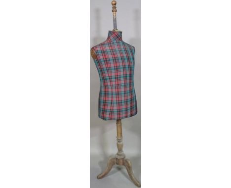 A green and red tartan dress makers mannequin, 158cm high. 