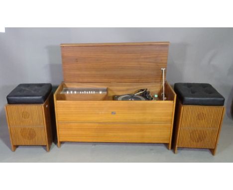 A 20th century teak cased Garrard record player and a pair of speakers/ stools with cushioned leather tops. 