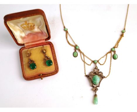 A Sterling silver gilt, colourless and pale green cabochon paste imitating jade pendant necklace, in an openwork design, deta