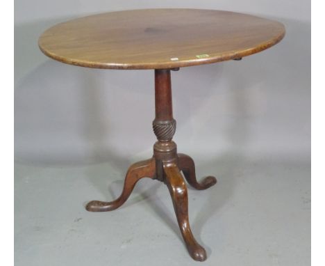 A George III mahogany circular tripod table on downswept pad supports, 78cm wide x 69cm high. 