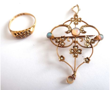 An 18ct gold and diamond five stone ring, mounted with a row of small cushion shaped diamonds, Chester 1910, ring size M and 