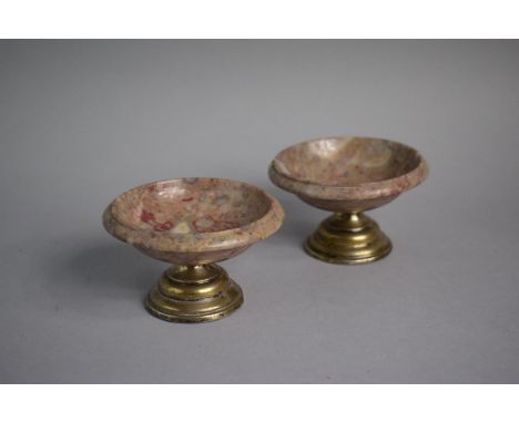 A Pair of Continental Circular Marble Salts on Silver Turned Socles. 9.75cms Diameter 