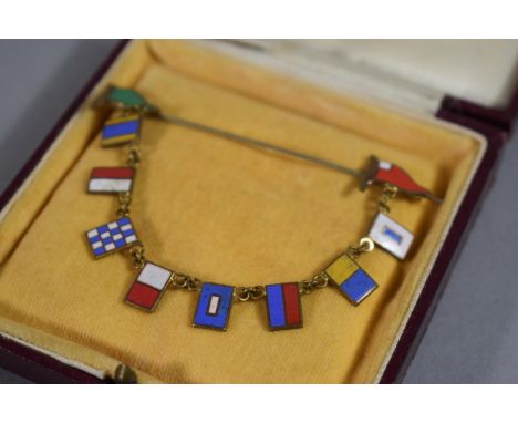 A Pretty Enamel Semaphore Brooch, 6.5cm Wide. 