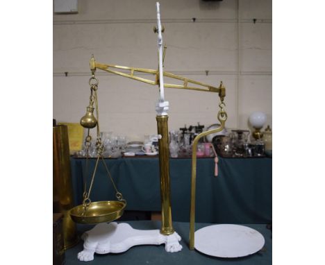 A Co-operative Wholesale Society Brass and Iron Beam Balance Scales.