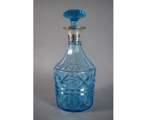 An Edwardian Silver Mounted Blue Glass Decanter. Sheffield, 1928, William Hutton &amp; Son. 27.5cm High. 