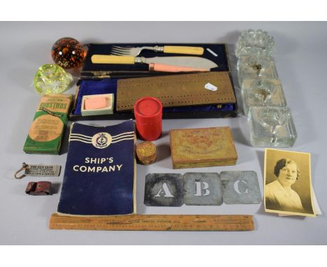 A Tray of Curios to Include Fish Servers, Cribbage Board, Metal Stencil Alphabet, BOAC Soap, Glass Paperweights and Inkwells 