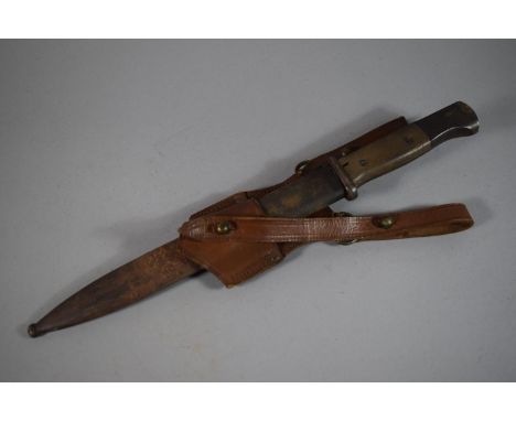 A WWII German Bayonet in Scabbard No 43 ASW, 9093 with Leather Belt Mount Inscribed in Ink 'German Bayonet Holland Sept 1945'