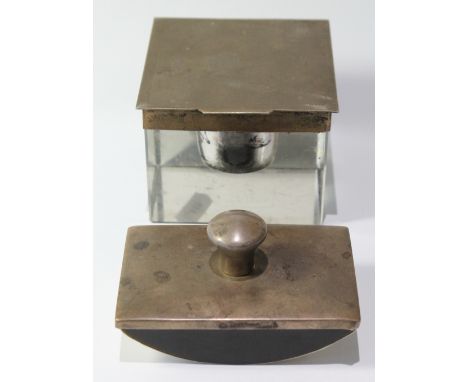 Cut glass inkwell, square, with silver mount and engine-turned lid, Birmingham 1935, also a silver-mounted blotter.   (2) Con