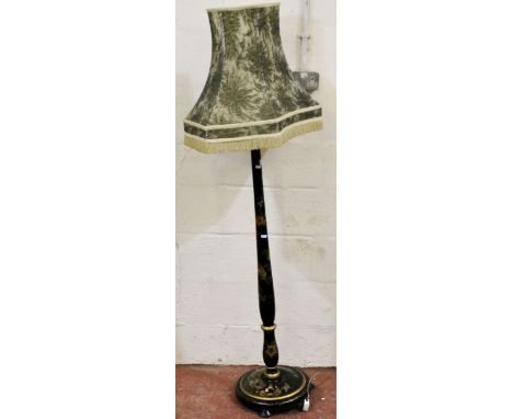 Black lacquer standard lamp with chinoiserie decoration.