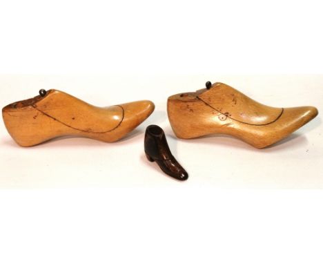 Pair of treen shoes, 12cm long, and a Victorian treen shoe pin cushion, 3cm high.