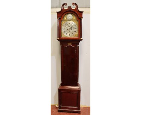 Early 20th century mahogany eight day longcase clock, the arched dial with silvered chapter and subsidiary dials, 221cm high.